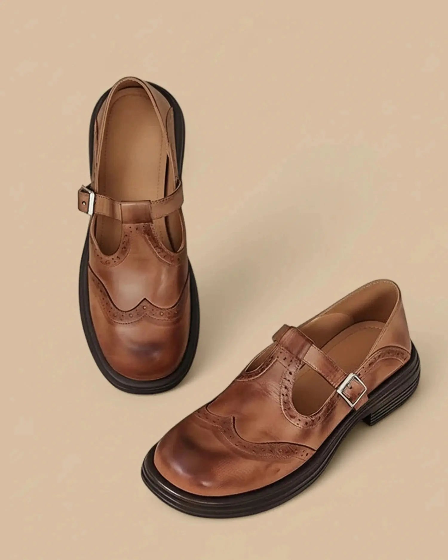 View of stylish supportive Mary Jane shoes in navy blue, featuring a comfortable strap and cushioned sole