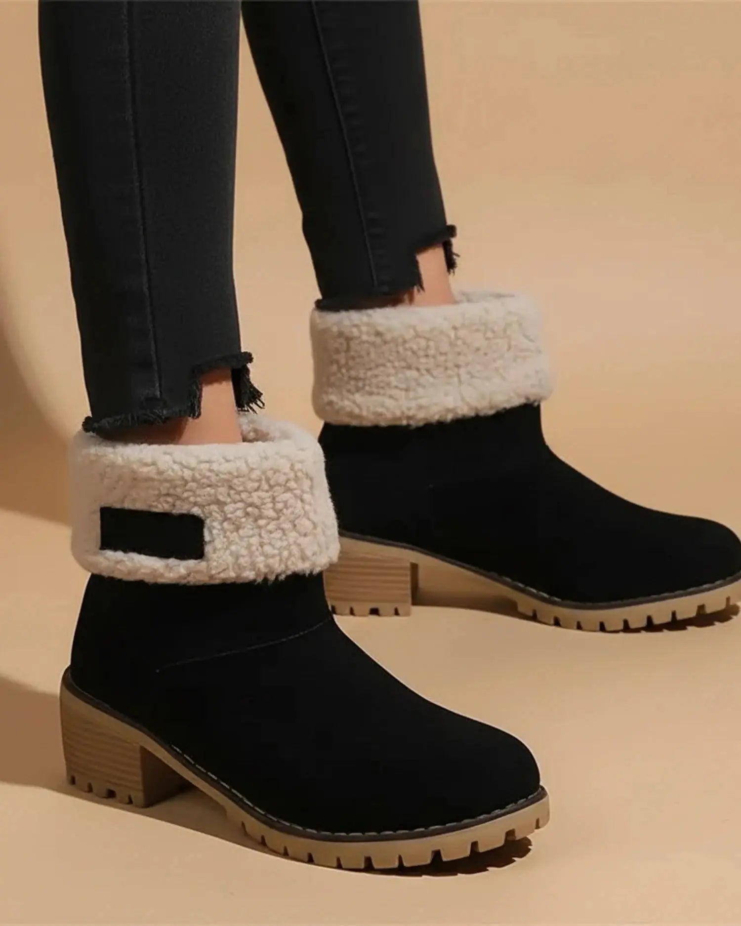Stylish women's ankle boots in rich brown leather, featuring a zipper and a comfortable low heel, view