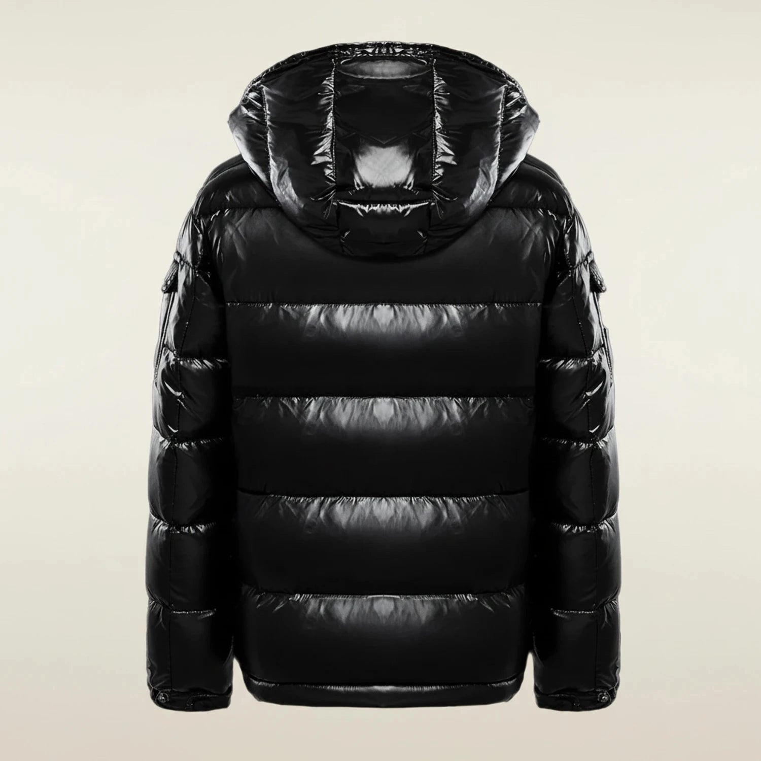 View of a stylish quilted winter puffer jacket in dark gray, featuring a high collar and adjustable hem
