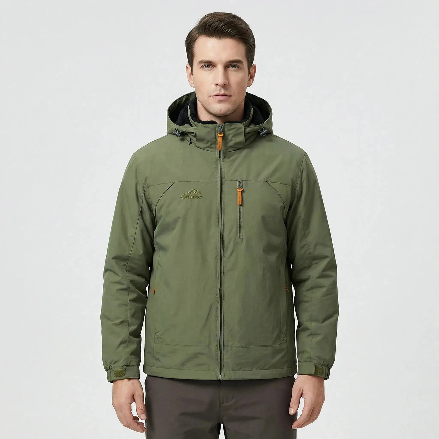 View of a men's water repellent outdoor jacket in dark green, featuring a zippered and adjustable cuffs
