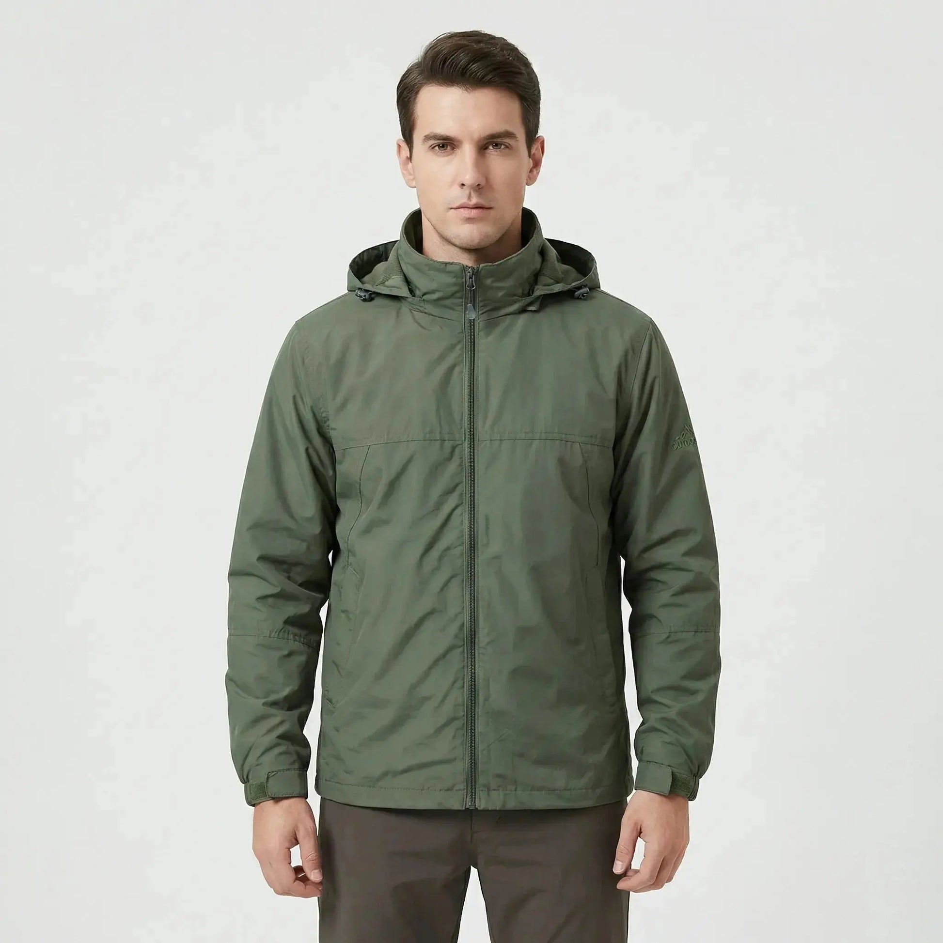 View of a sleek autumn jacket in deep green, featuring a smooth fabric, zippered , and pockets