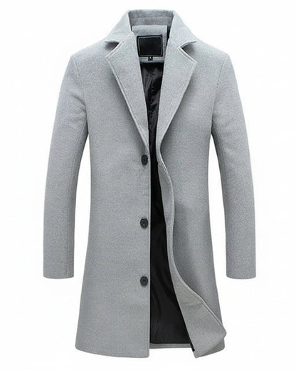 View of a classic formal overcoat in dark gray wool, featuring a tailored fit and notched lapels