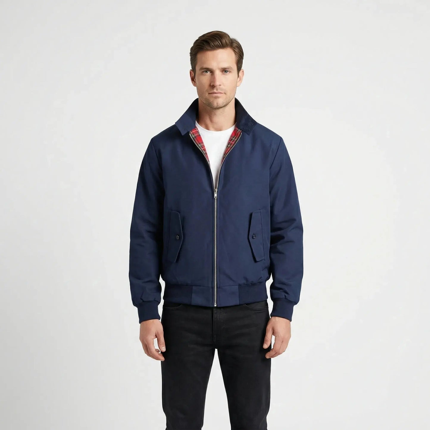 View of a dark gray winter jacket featuring a high collar, buttoned , and textured fabric