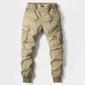 View of relaxed fit summer cargo jogger pants in olive green, featuring multiple pockets and a comfortable waistband