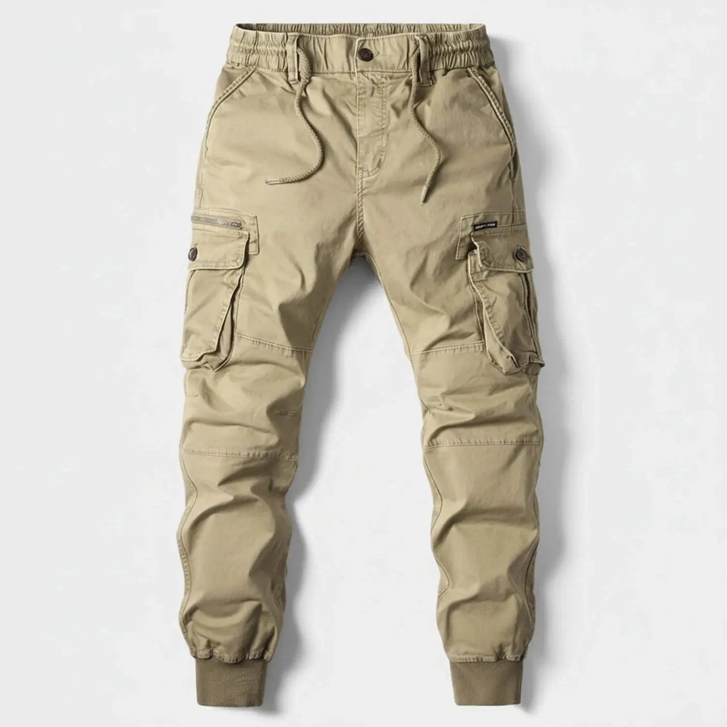 View of relaxed fit summer cargo jogger pants in olive green, featuring multiple pockets and a comfortable waistband