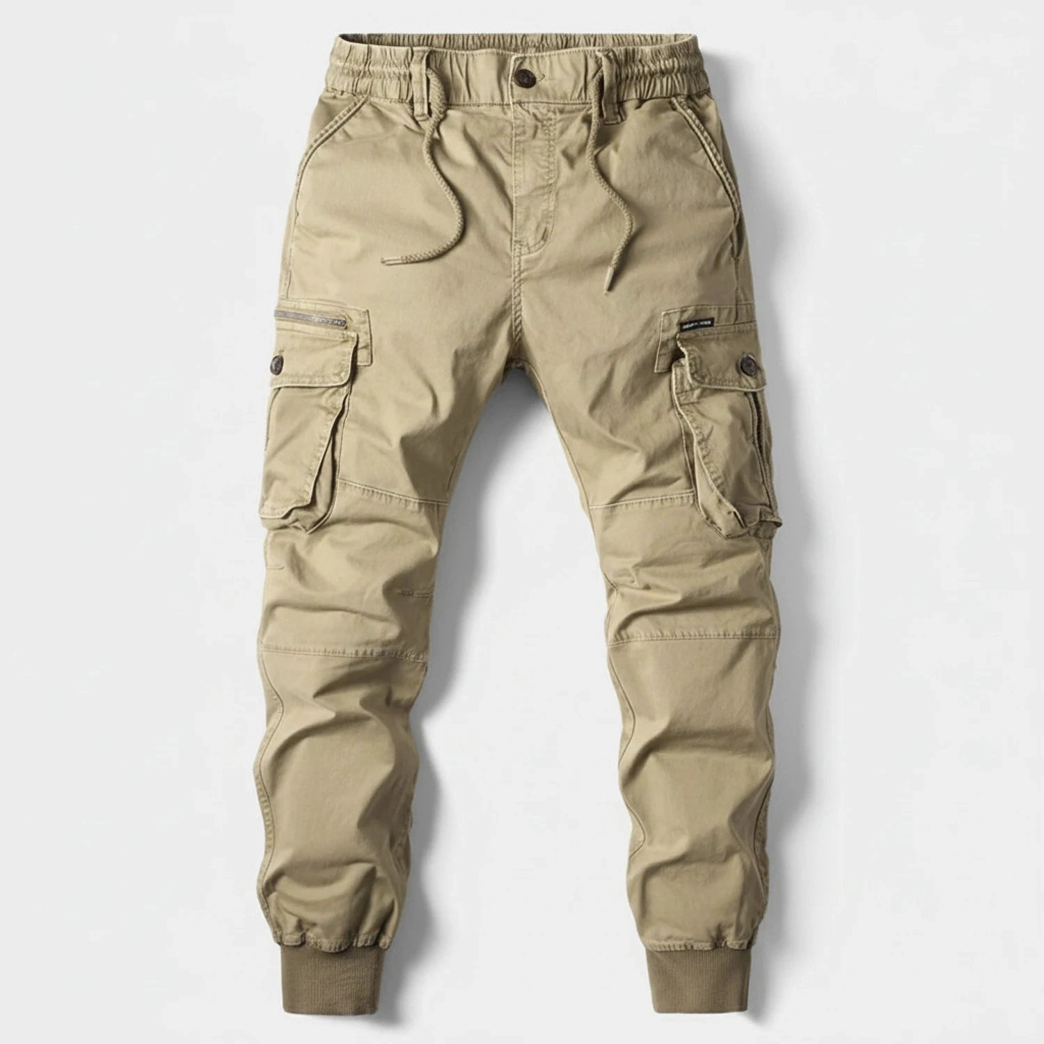 View of relaxed fit summer cargo jogger pants in olive green, featuring multiple pockets and a comfortable waistband
