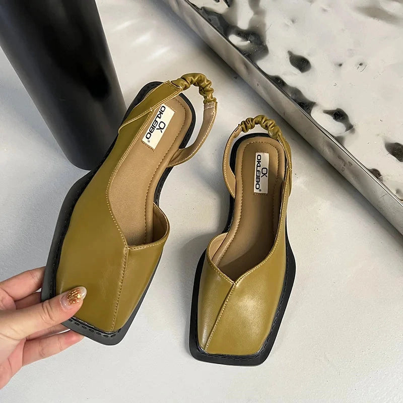View of elegant women's summer slingback shoes in soft beige fabric with a comfortable ankle strap and open toe design