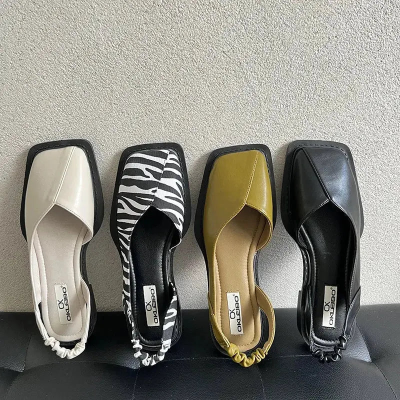 View of elegant summer slingback shoes in soft beige fabric, featuring a comfortable cushioned insole and stylish open