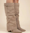 View of chic slouchy knee high boots in soft black suede with a relaxed fit and rounded toe