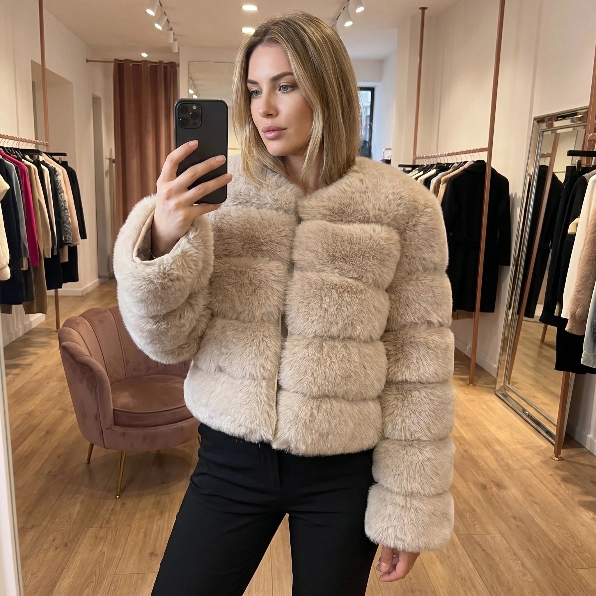 View of a luxurious fluffy autumn coat in soft beige, featuring a cozy collar and button closure