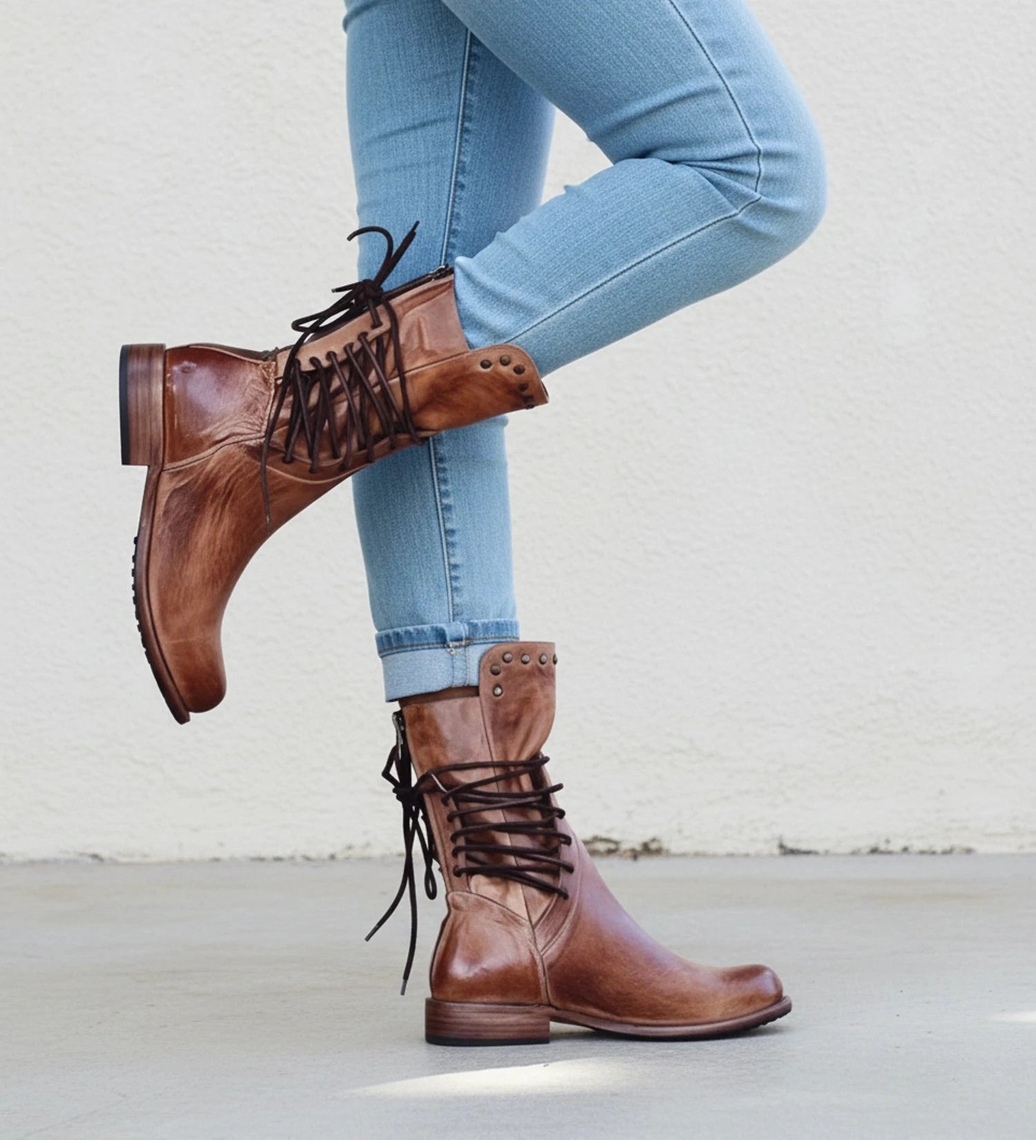 View of classic modern orthopedic boots in dark brown leather, featuring a sturdy sole and cushioned ankle support