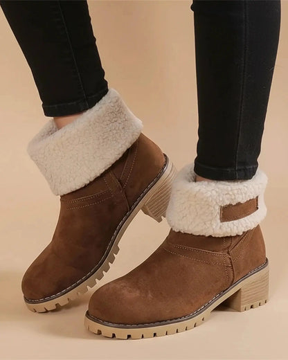 View of stylish women's ankle boots in rich brown leather, featuring a sleek design and comfortable low heel