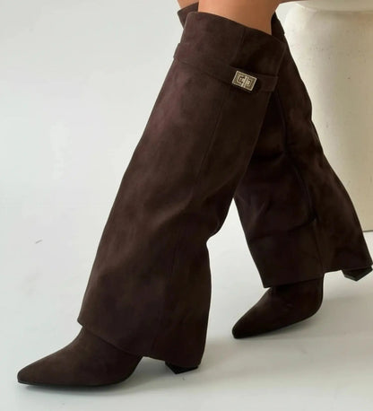 View of chic slouchy knee high boots in soft black suede, featuring a relaxed fit and stylish fold over top