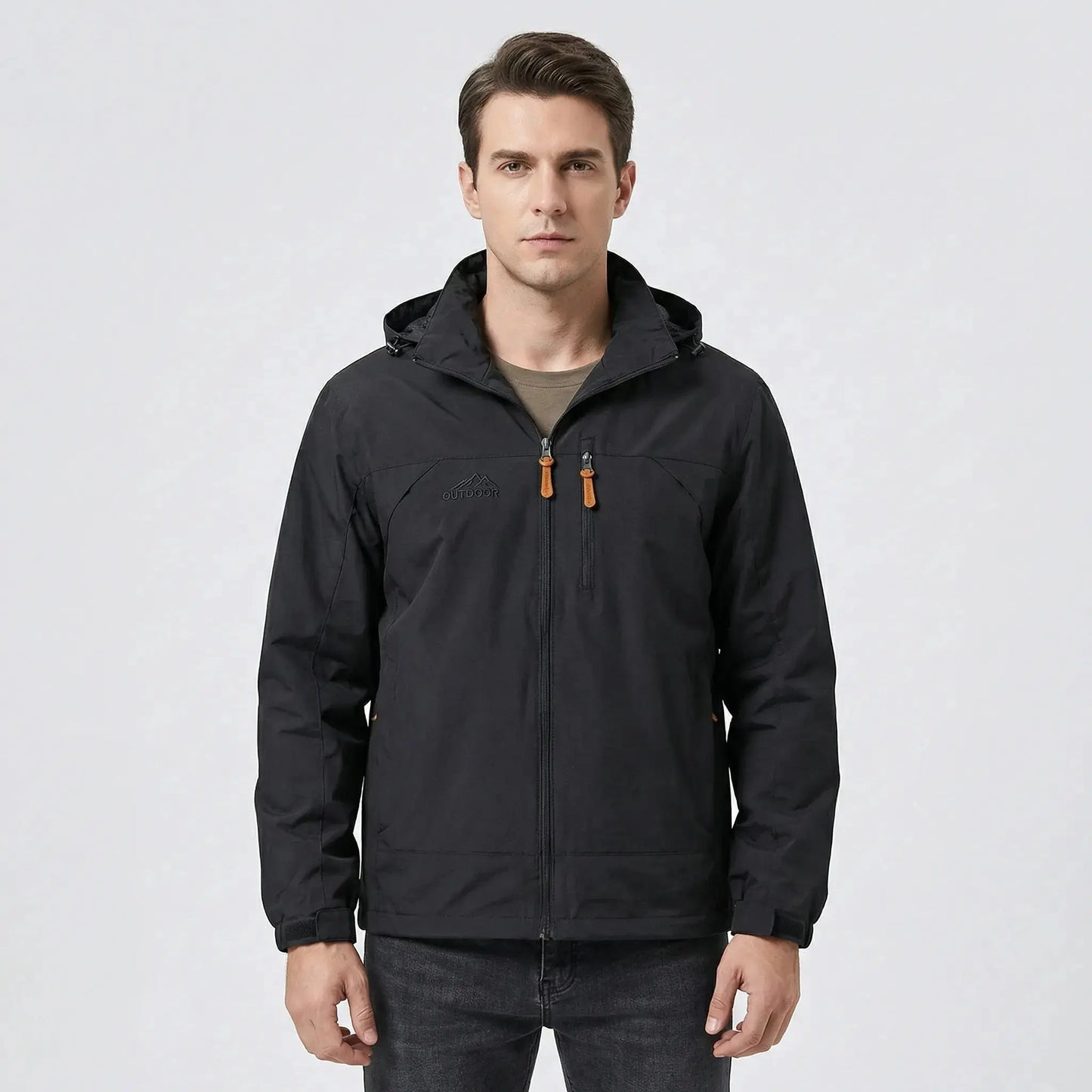 View of a water repellent outdoor jacket in dark green, featuring a high collar and zippered pockets