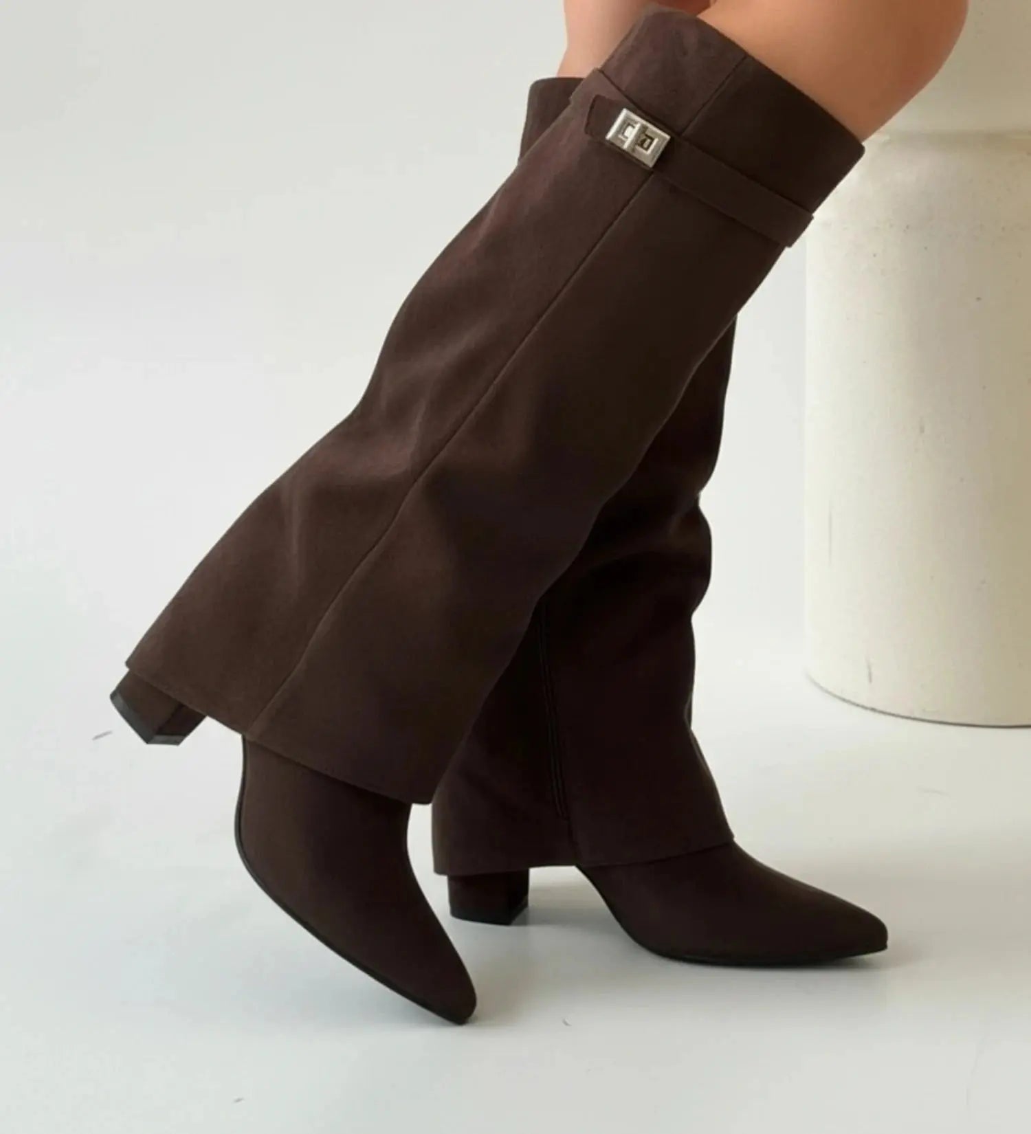View of chic slouchy knee high boots in soft black suede with a relaxed fit and rounded toe