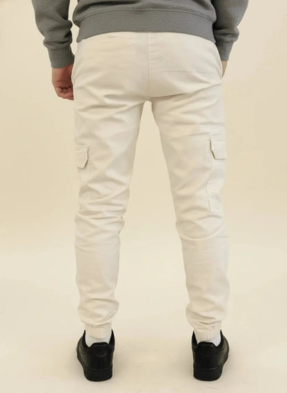 View of modern slim tapered cargo pants in olive green, featuring multiple pockets and a soft cotton blend material