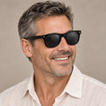 sunglasses — Black Charcoal eyewear worn by an adult model