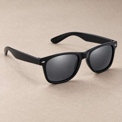 sunglasses — Black Charcoal eyewear, complete individual pair on warm neutral stone; product angle — view 3