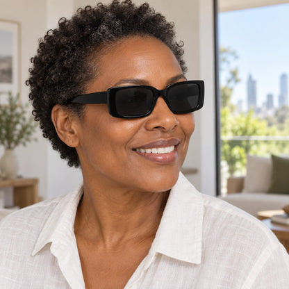 sunglasses — Black Charcoal eyewear worn by an adult model; angle — view 5