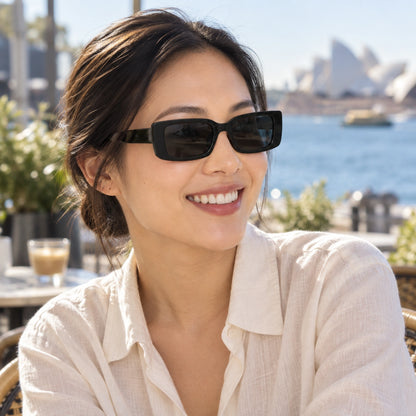 sunglasses — Black Charcoal eyewear worn by an adult model — view 6