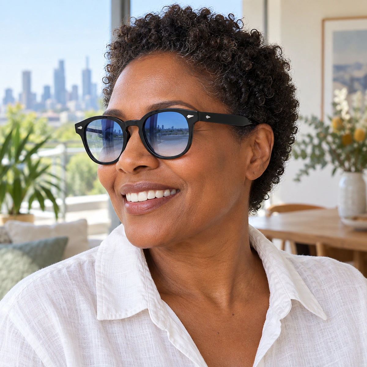 sunglasses — Jack rounded square eyewear in Black Blue Gradient, worn by a happy adult model, angle — view 30