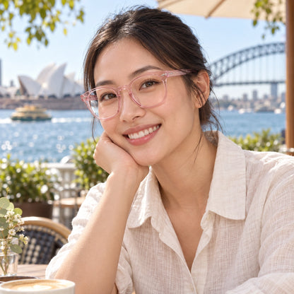 sunglasses — Jack rounded square eyewear in Pink Clear, worn by a happy adult model — view 31